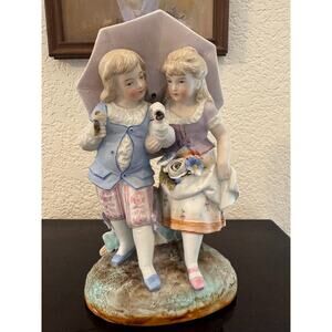 Vintage Bisque Porcelain Figurine – Boy & Girl with Umbrella and Flowers